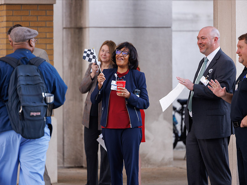 Chief Nursing Executive Kristina Cherry, center, and other UMMC leaders greet employees arriving at the Adult Hospital Monday morning to kick off Patient Safety Week.
